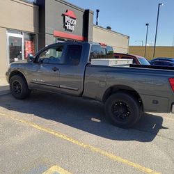 09 Nissan Titan Grey/Black Rims,160,000.