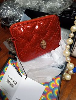 Kurt Geiger  n  KateSpade