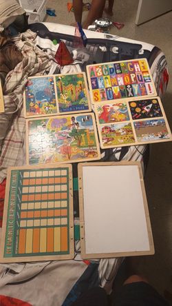 Puzzles with responsibilities chart and white board