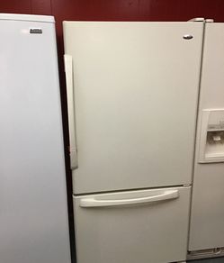 Used Amana bottom freezer fridge. 1 year warranty