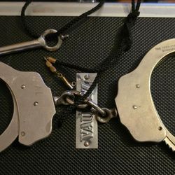 Authentic LE handcuffs not sold to public