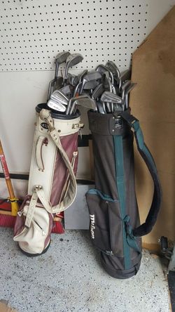 Golf clubs with bags