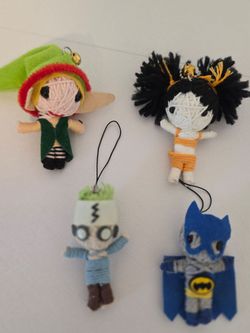 Sixteen voodoo dolls