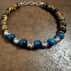 Blue and Brown Beaded Tigers Eye Bracelet with Polished Finish