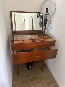 Vanity with broken mirror