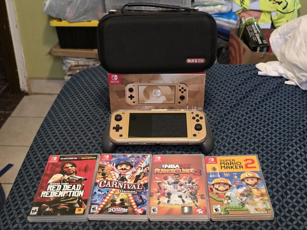 Gold Nintendo Switch Lite Bundle With 4 Games!!