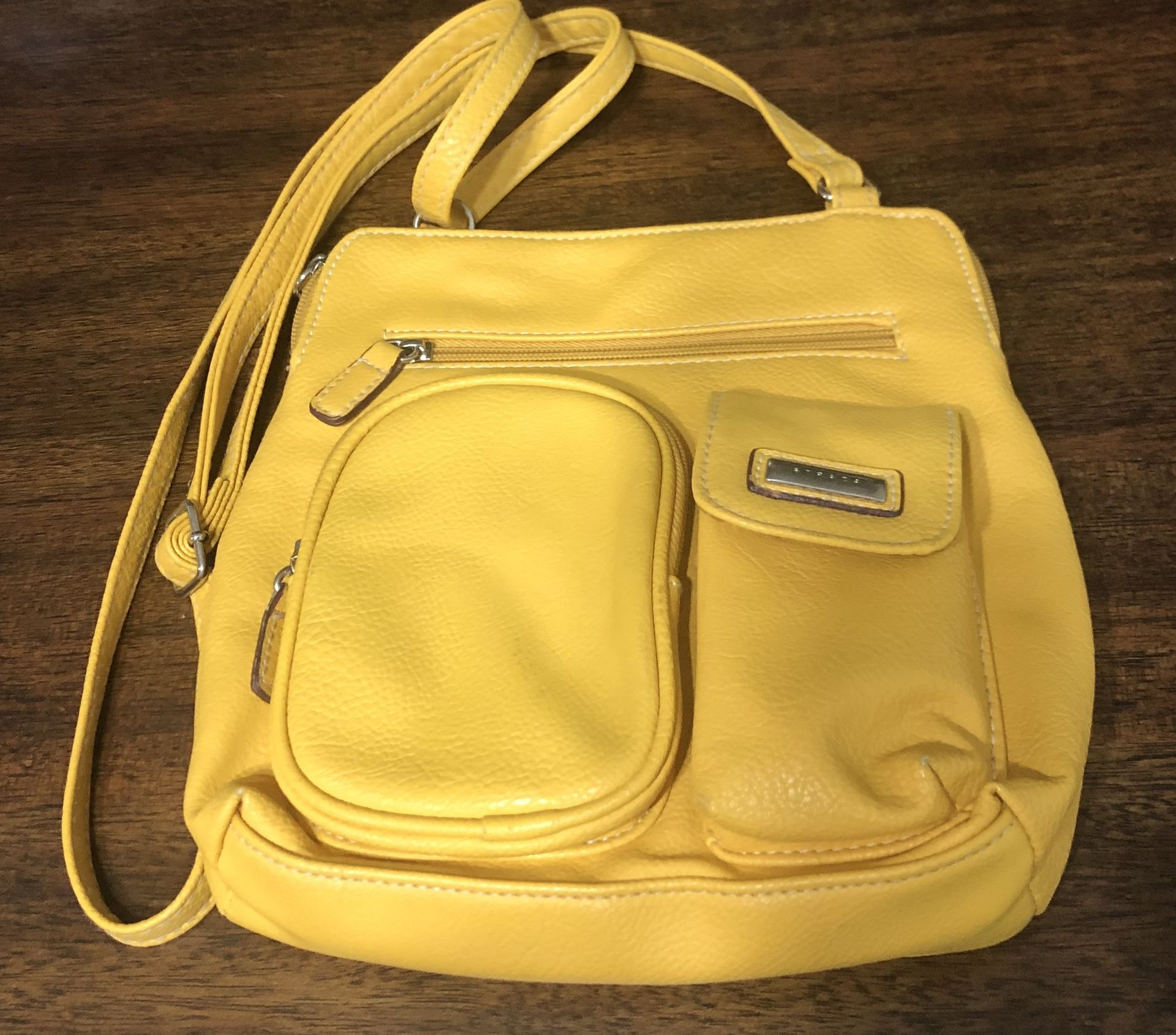 Strada women’s crossbody bag multiple  outside and inside zip pockets yellow.