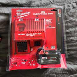 Milwaukee Battery, Charger, and Impact. Drill 