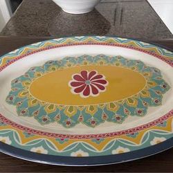 Oval extra large plate with vibrant patterns and floral design. Certified International Valencia