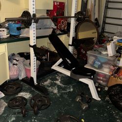 Adjustable Bench press set with 300lb Olympic weight set 