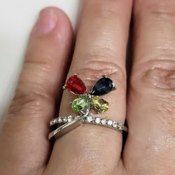 Silver Ring with blue, red, green, and yellow gemstones Size 8 