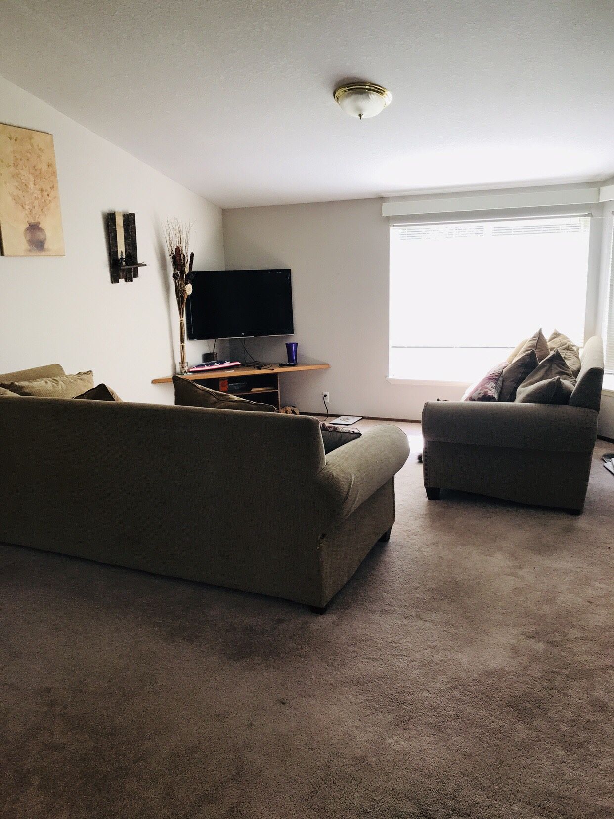 Large beige sectional couch