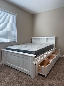 White full bed with drawers and mattress