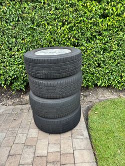Set of four 2010 toyota tundra chrome stock wheels and tires
