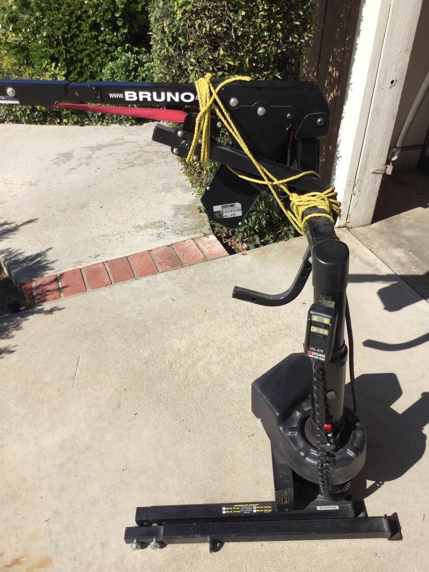 Bruno Hydraulic Lift. Able to raise an electric chair and place inside a van. If new price would be $1000 more. Works Great!