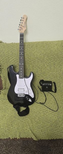 Beginner electric guitar with portable amp