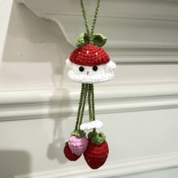 Cute kawaii crochet strawberry themed accessories for bag, car, and home decor.