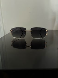 Black Cartier Rimless Sunglasses