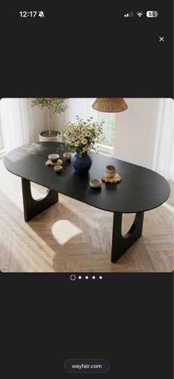 Black Oval Dining Table with Arch Base