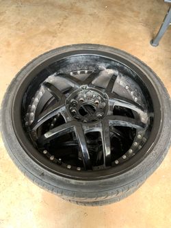 Black 20 Inch Rims and Tires.