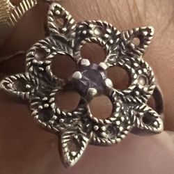 Sterling silver . 925 flower ring with purple stone
