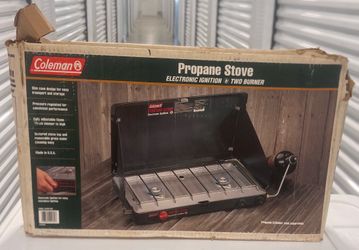 Coleman Two Burner Propane Stove with electric ignite. Used in good condition with normal signs of usage.  Location below  31705 CR 54,  Wesley Chapel