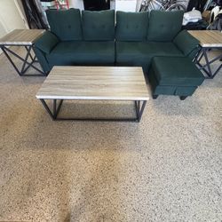 Green Sectional With Ottoman And Two End Tables And Coffee Table