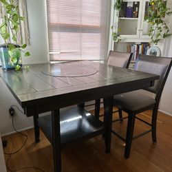 Tall kitchen table with lazy susan and 4 chairs