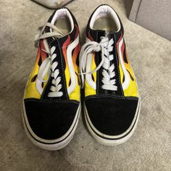Vans with fire design. Size 6 Mens. Size 7.5 Women’s. 