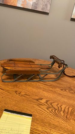 Decorative replica of a wood & metal snow sled