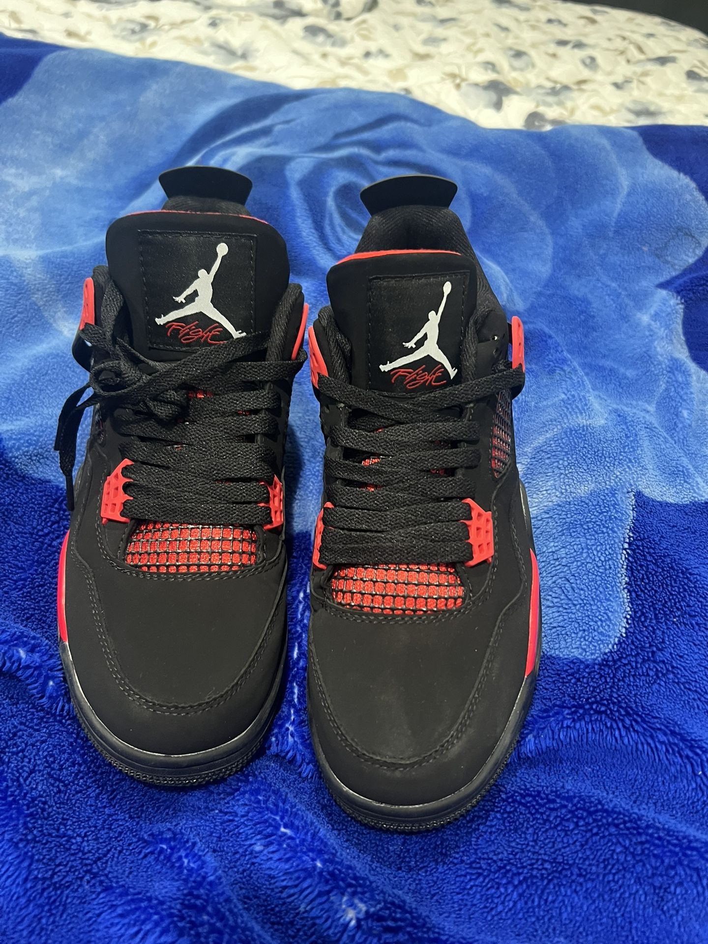 Jordan 4 Retros Thunder Red