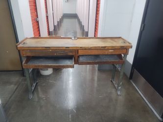 Two sided wooded bench for jewelers
