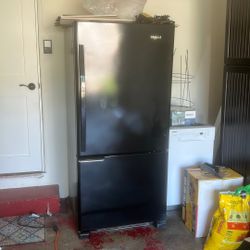 Whirlpool Refrigerator-black. Appears 2017