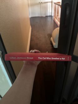 The Cat Who Smelled a Rat by Lilian Jackson Braun