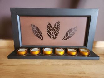 GENTLY USED LEAF CANDLE HOLDER CAN HANG ON WALL OR SIT ON TABLE