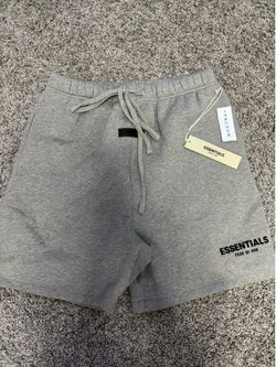 Gray fear of god essential shorts size medium comes with bag and tag