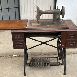 Antique White Rotary Treadle Sewing Table w/instruction book. . As is. Pick up deliver. 34x18x30
