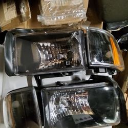 94///2001) DODGE RAM HEAD LIGHTS BLACK