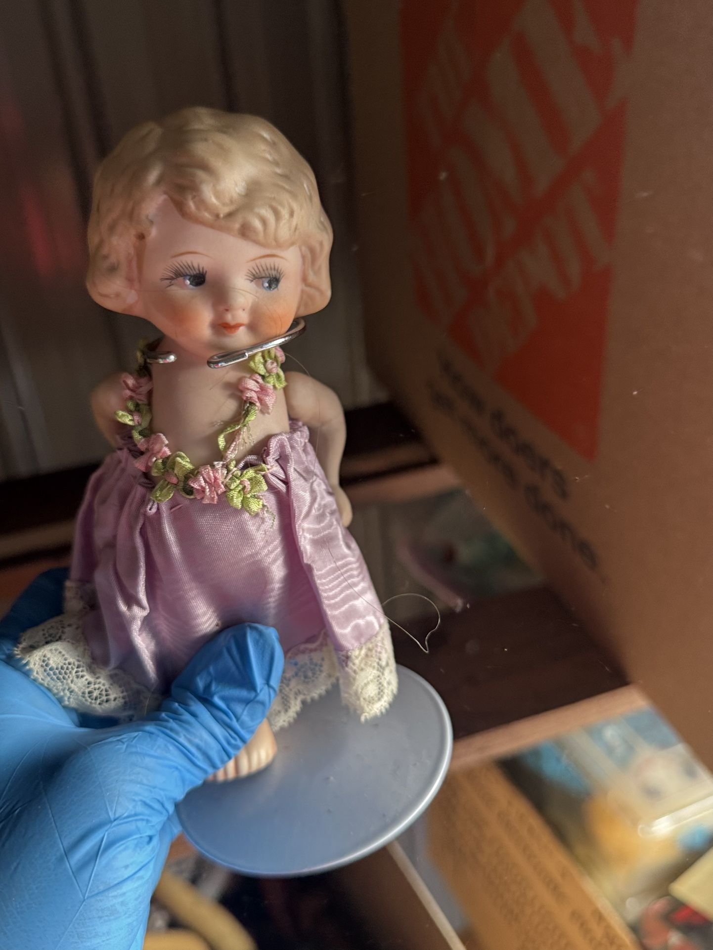 a vintage, possibly early to mid-20th century, Japanese-made bisque doll.