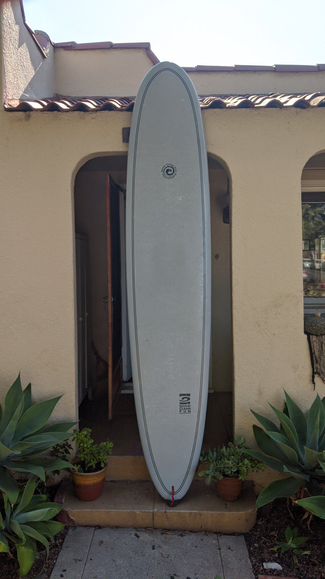 9' 6" long board surfboard