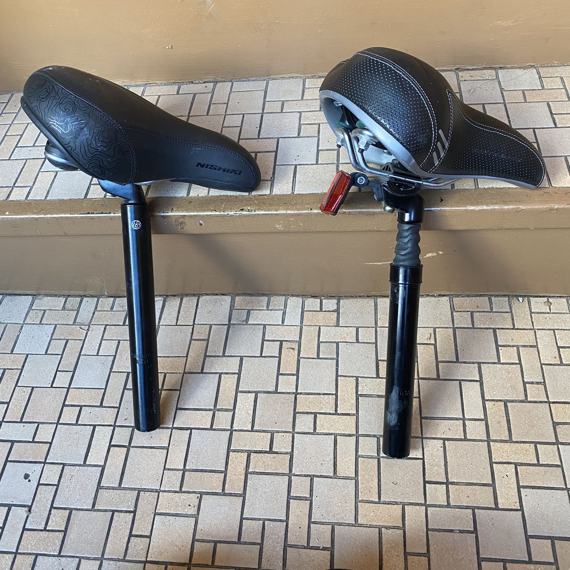 2 Cushioned Bike Saddle Seats and Bike Posts. Nishiki and Bontrager Both in Excellent condition with very little signs of wear. $60 takes both! Pic