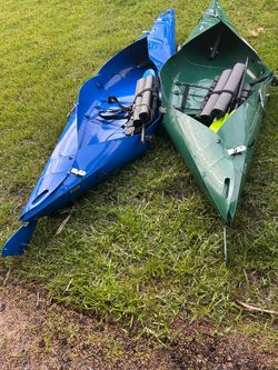 TuckTec roll up kayaks w paddles and seats
