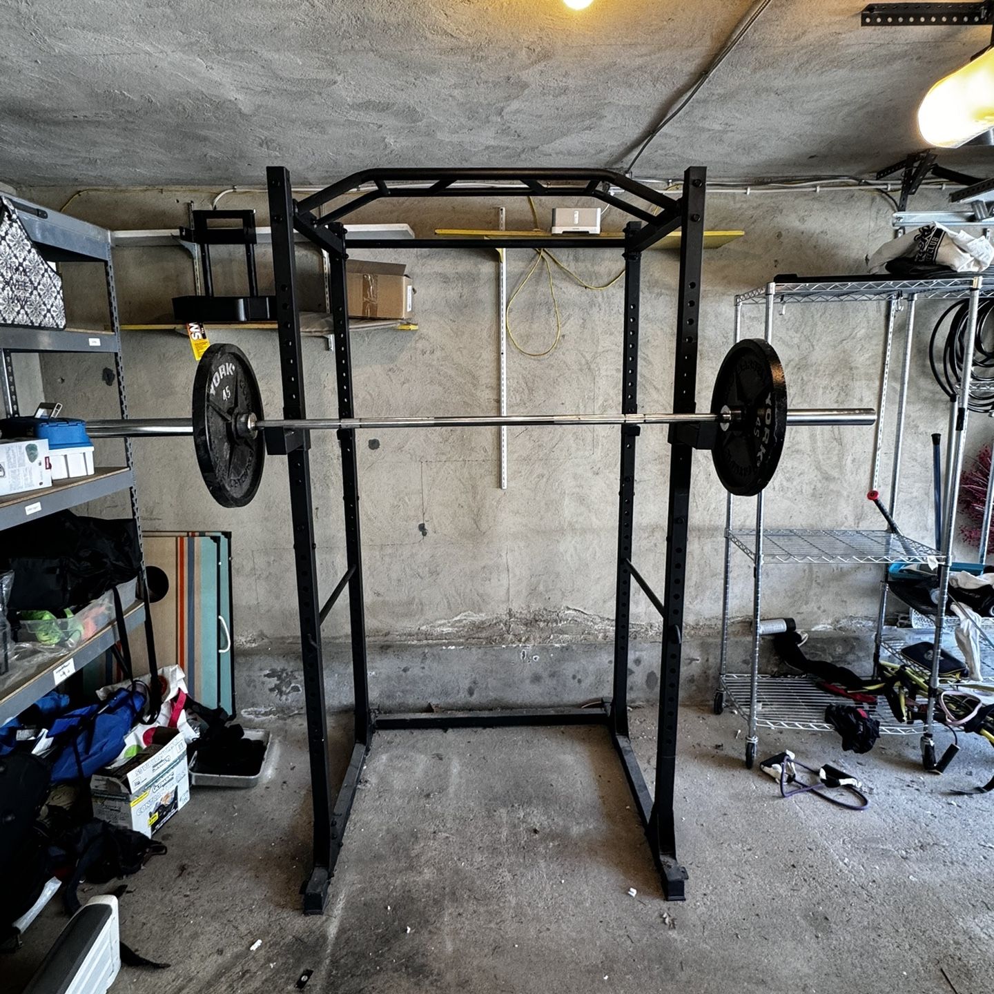 Squat Rack with a Barbell and 2 45 pound Plates