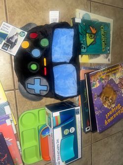 Children’s books throw blanket and unused kids dinnerware set