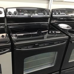 GE 4 Burner Glass Top Range. 1 year Warranty 