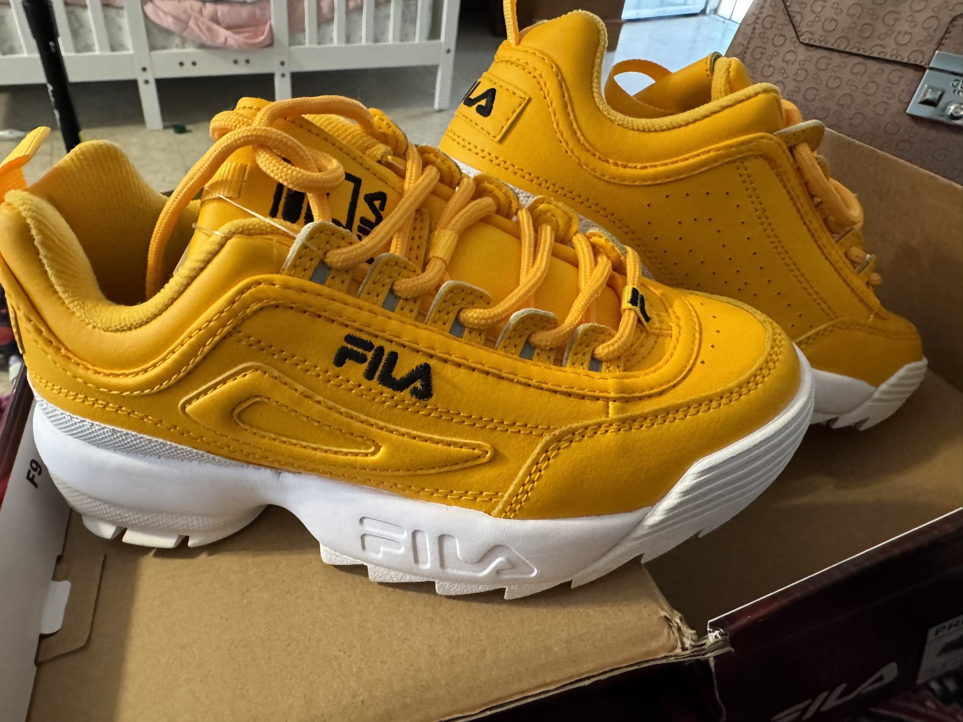 Yellow Fila Size 6