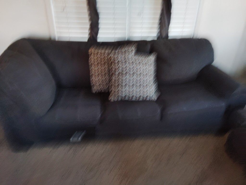 Couch And Ottoman With Pillows