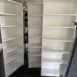 Three White IKEA Book Cases