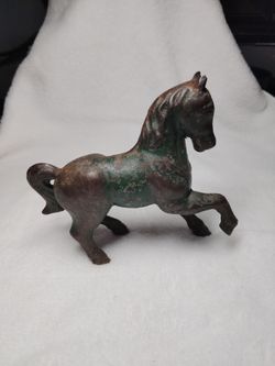 Vintage cast iron horse coin bank