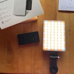 Brand New Unopened Portable Phone Light Clip, 6 oz, Rechargeable Ring Light for iPhone, Laptop, Camera
